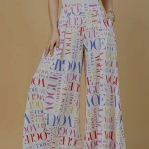 Wide leg pants that have multi color vogue all over them